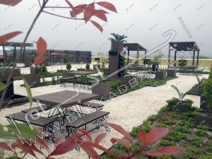 روف گاردن اکسین دریاسر شمال میز و چتر محوطه و فضای سبز روی پشت بام